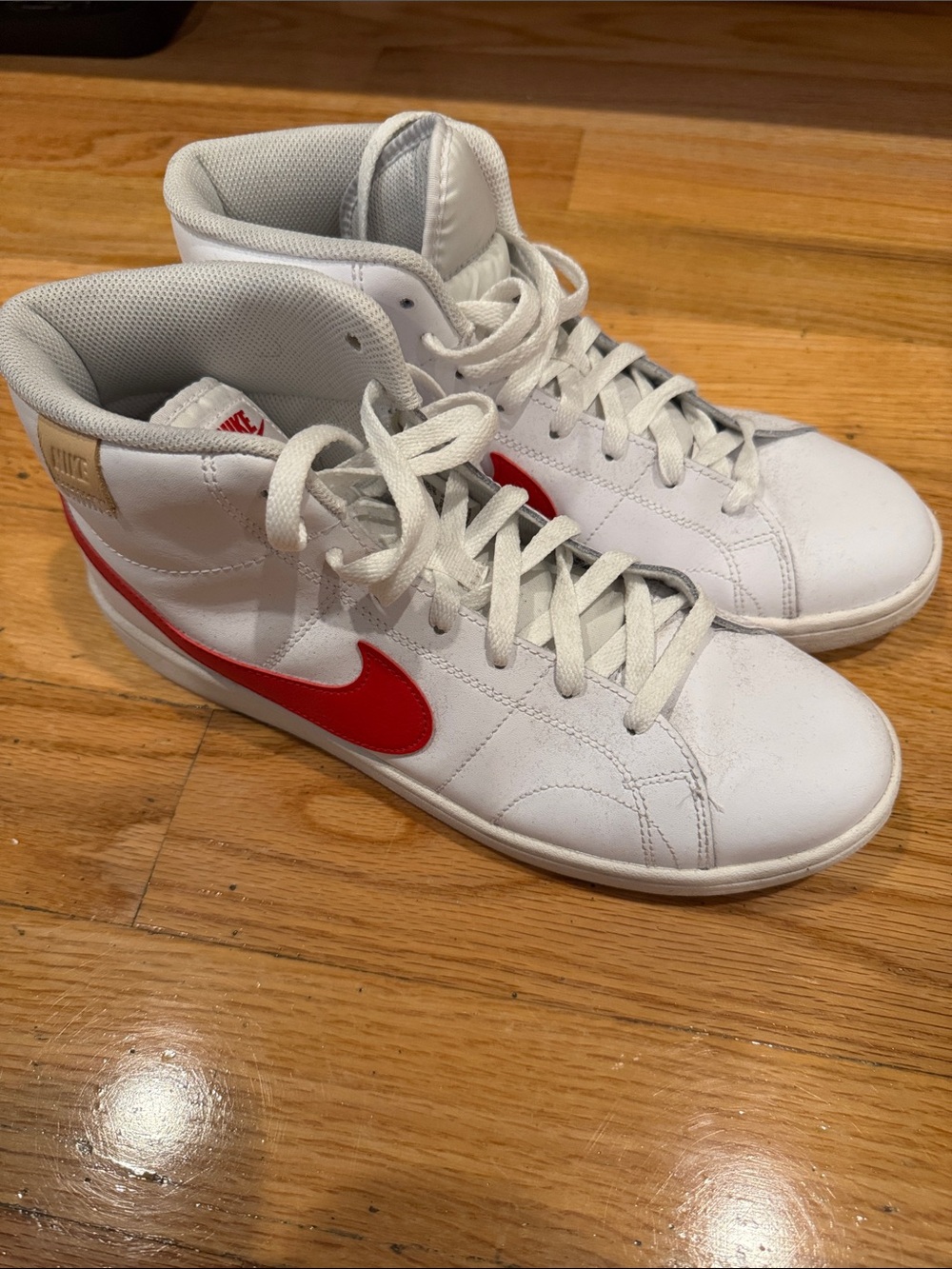 Nike Men's White Sneakers with Red Swoosh